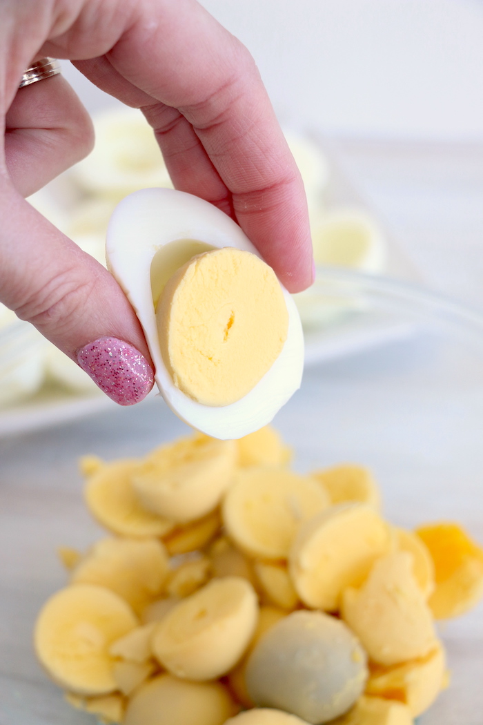 removing the yolk from a hard boiled egg