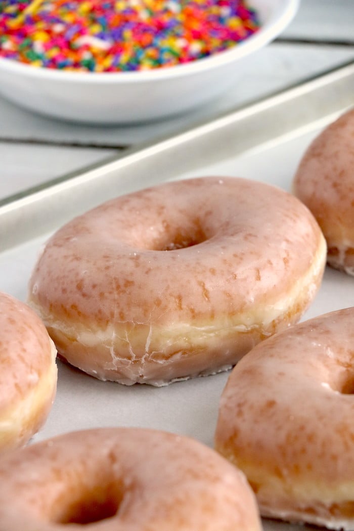 tray of glazed donuts