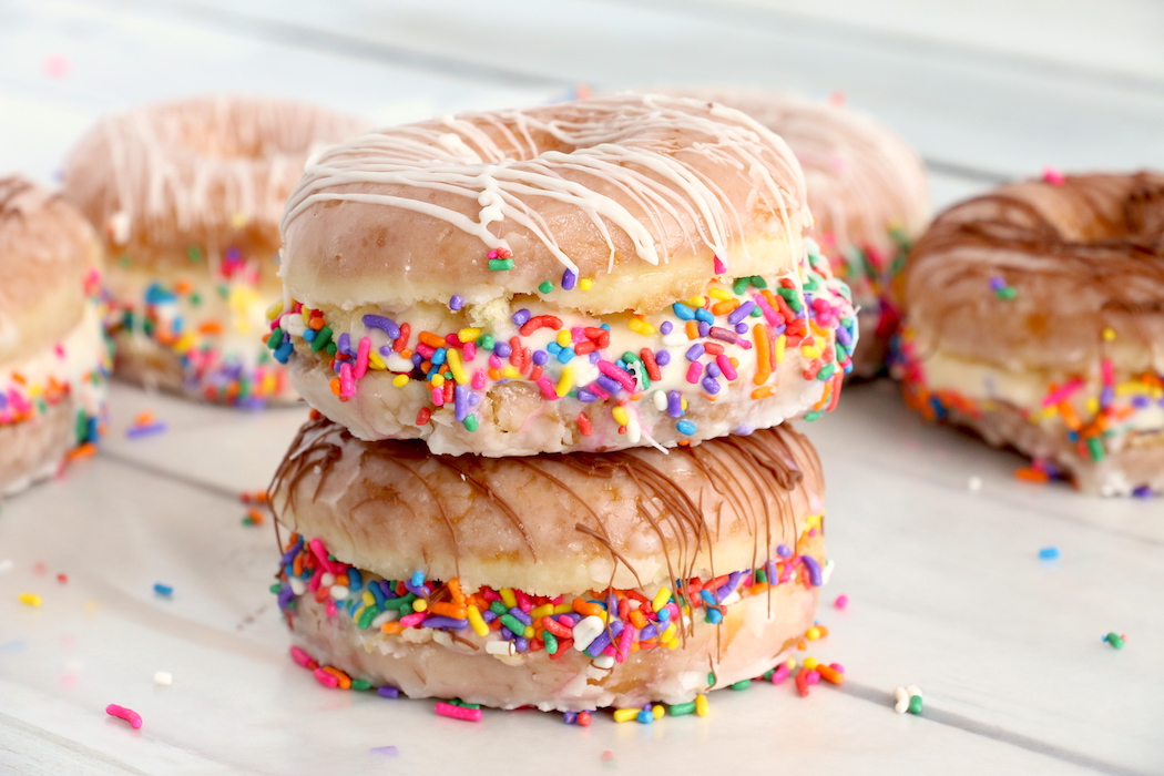 donut ice cream sandwiches stacked on top of one another