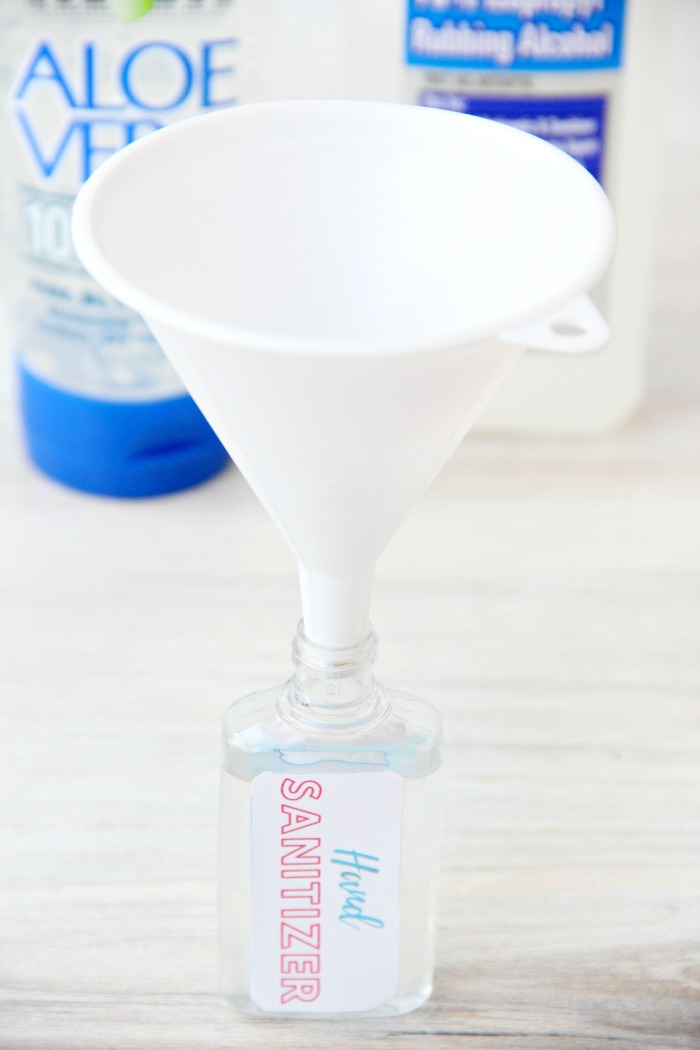 Funnel in hand sanitizer bottle