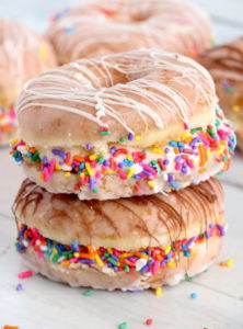 Stack of two donut ice cream sandwiches with sprinkles