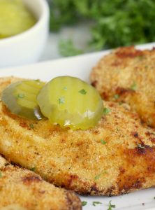 Chicken breasts with pickle slices on top