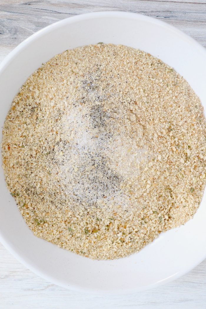 Seasoned breadcrumbs and salt and pepper in a bowl