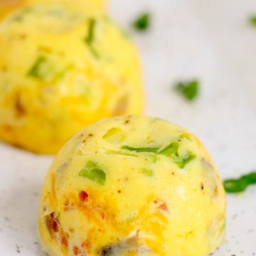 Egg bites lined up on a plate
