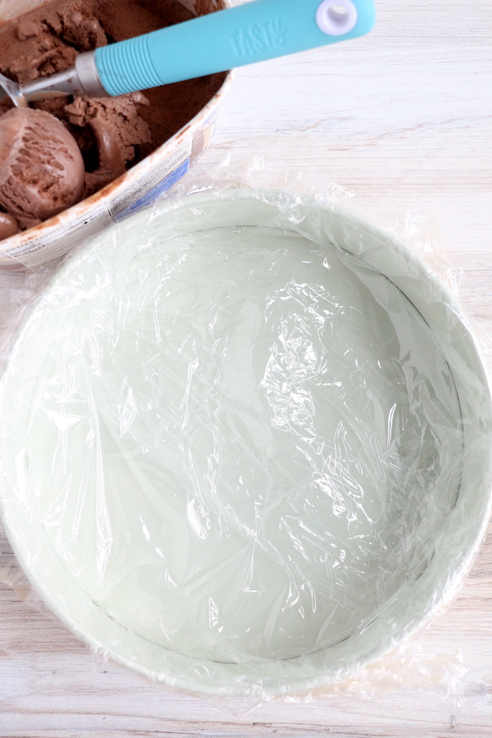 plastic wrap lined white baking dish