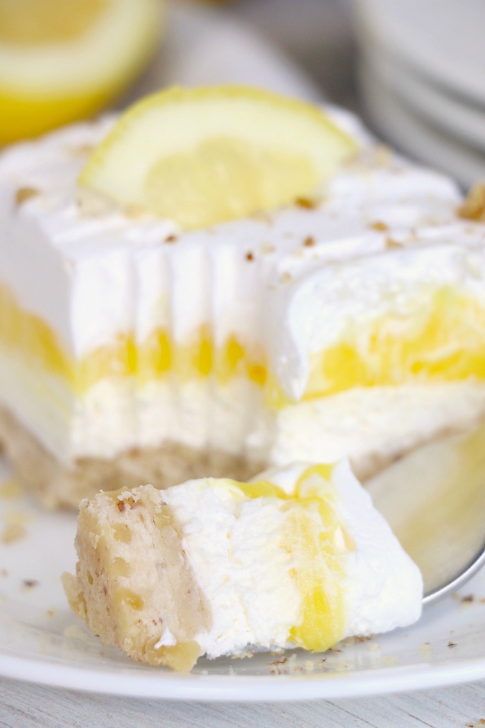 piece of lemon lush dessert on fork