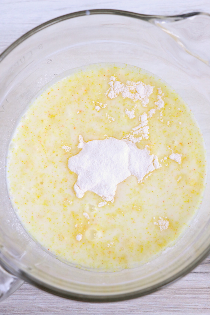 A mixture of lemon pudding and milk