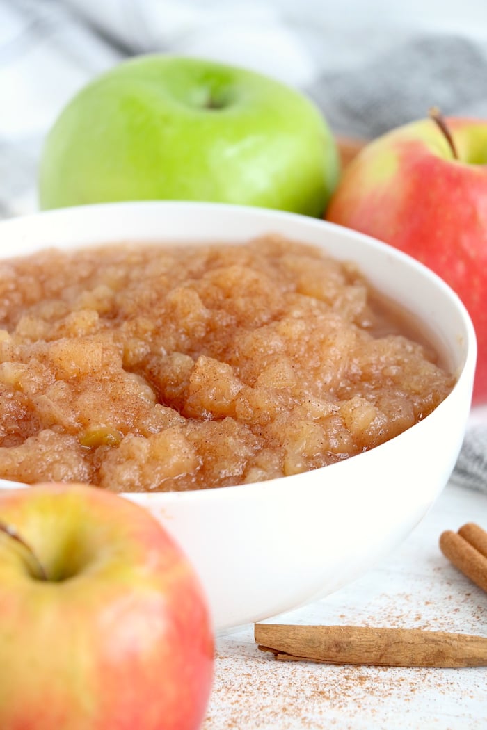 White bowl filled with applesauce