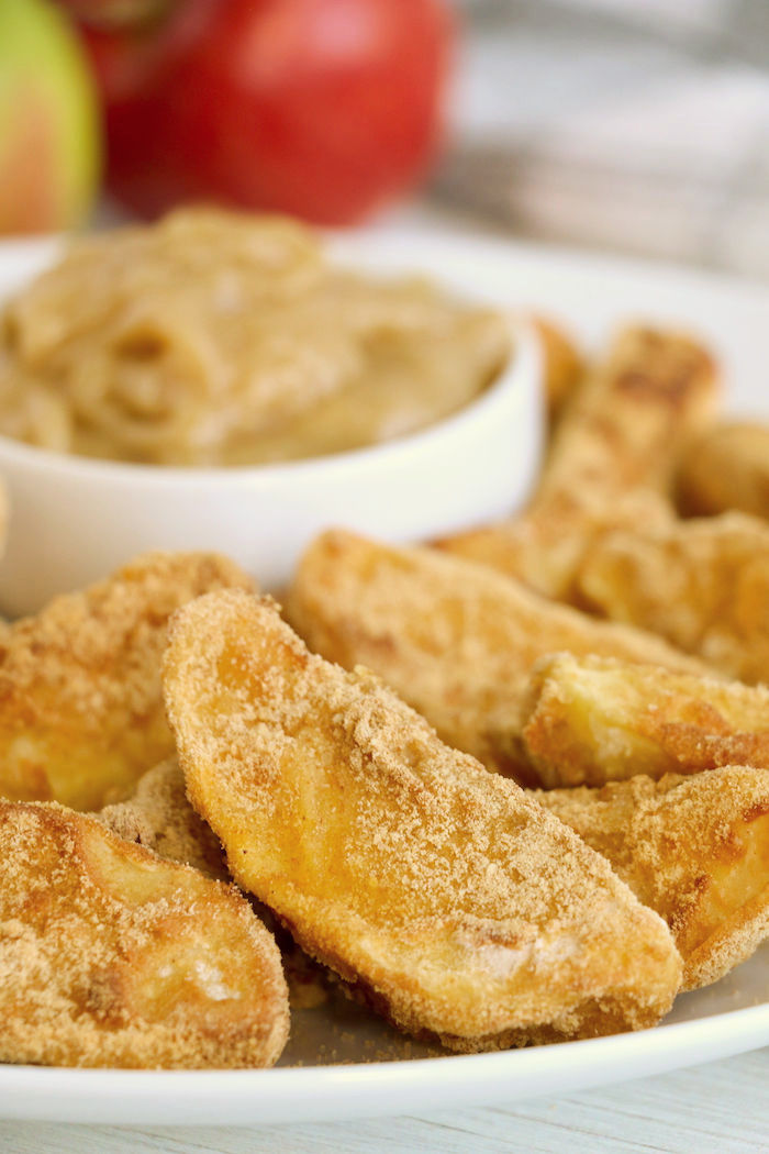 Plate of air fryer apple fries with caramel dip