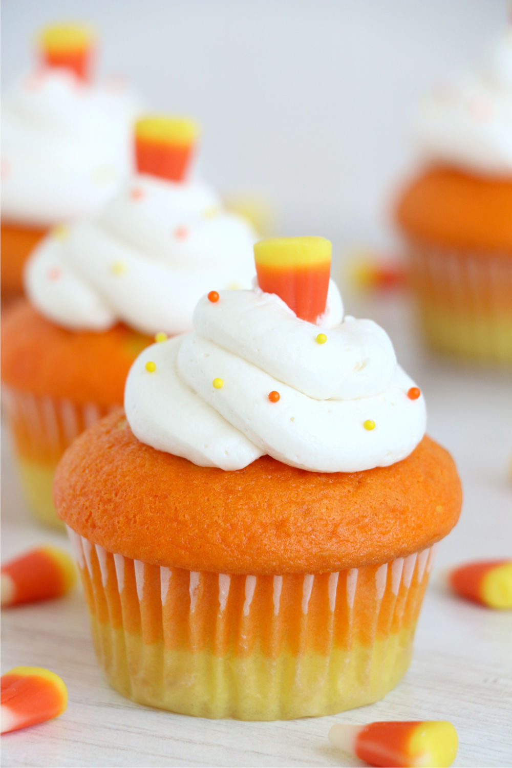 line of candy corn cupcakes