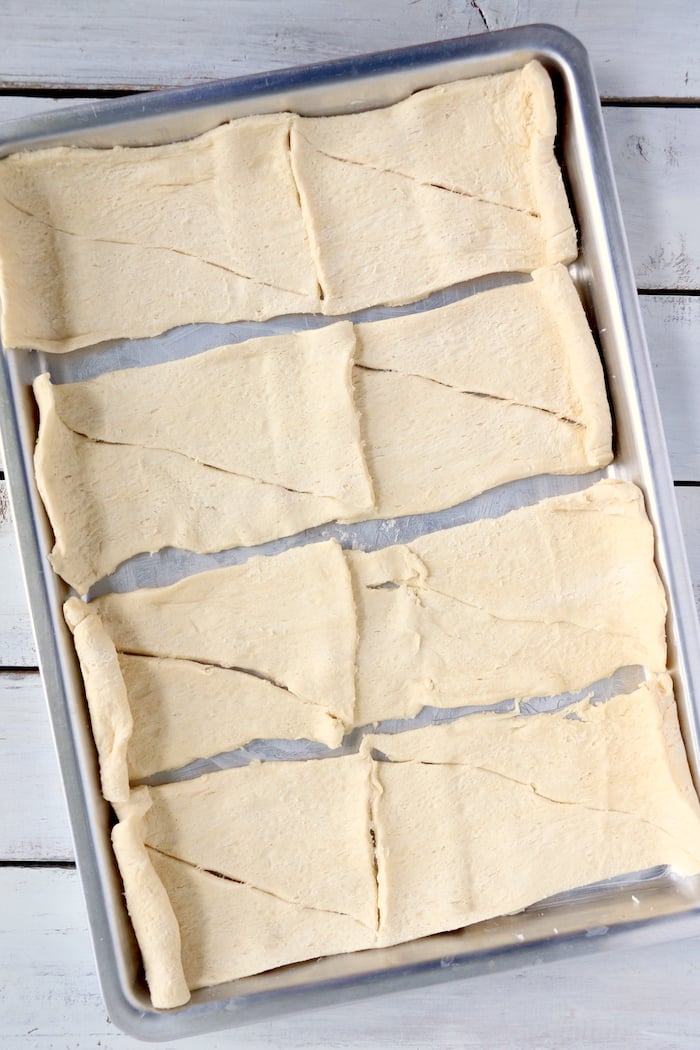 pieces of Crescent roll dough on baking pan