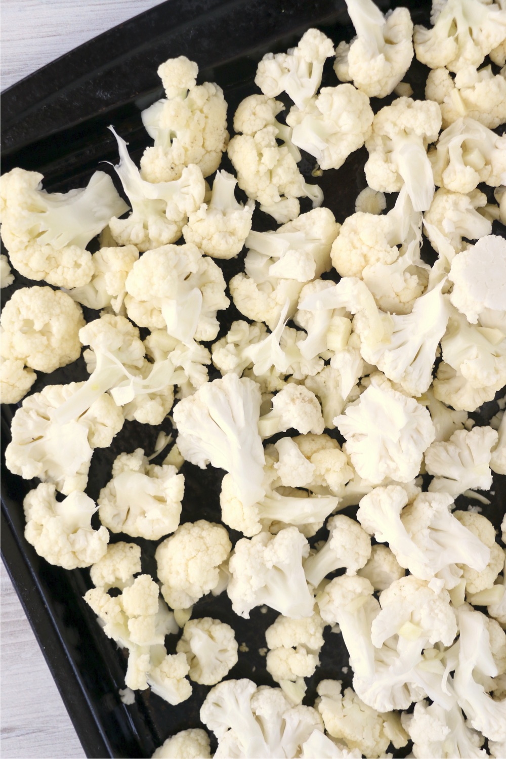 Cauliflower florets on a baking sheet