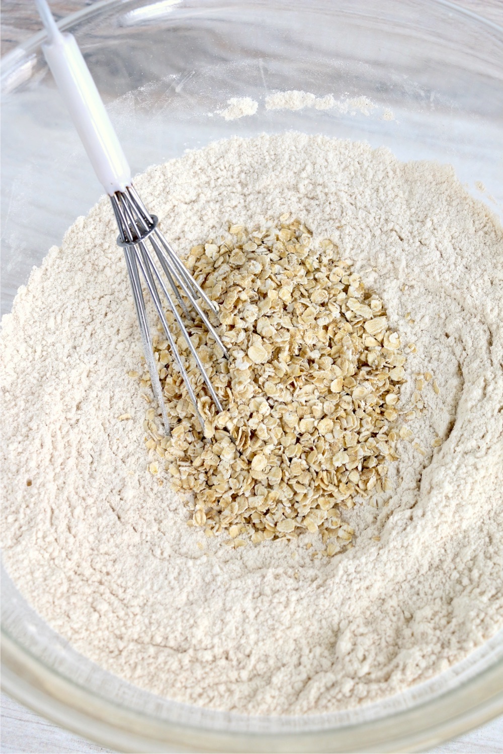 Adding oatmeal to crumb mixture