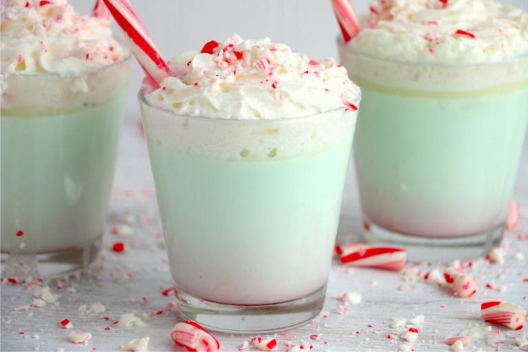 Glasses of mint hot chocolate with peppermint sticks