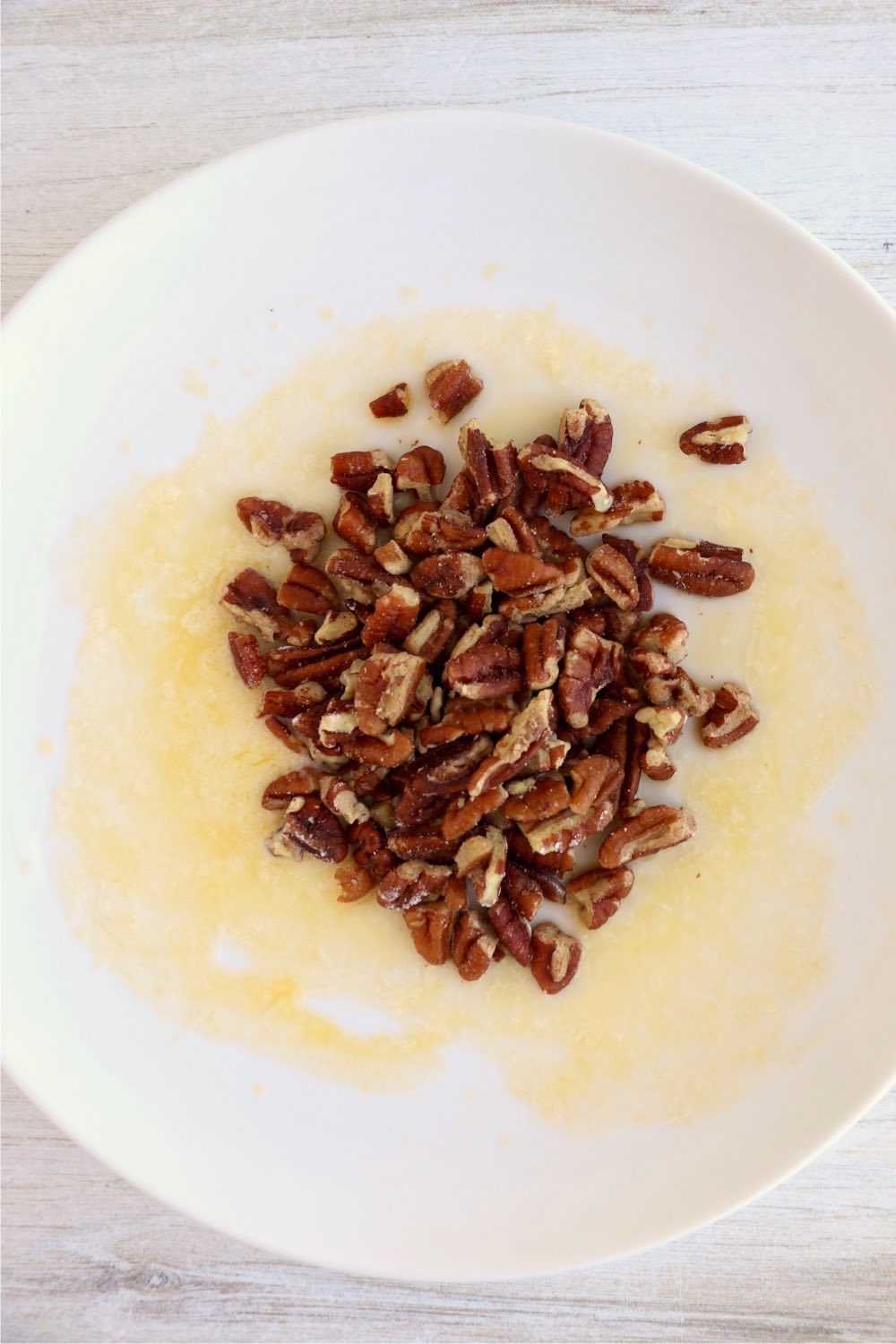 bowl of butter and pecans