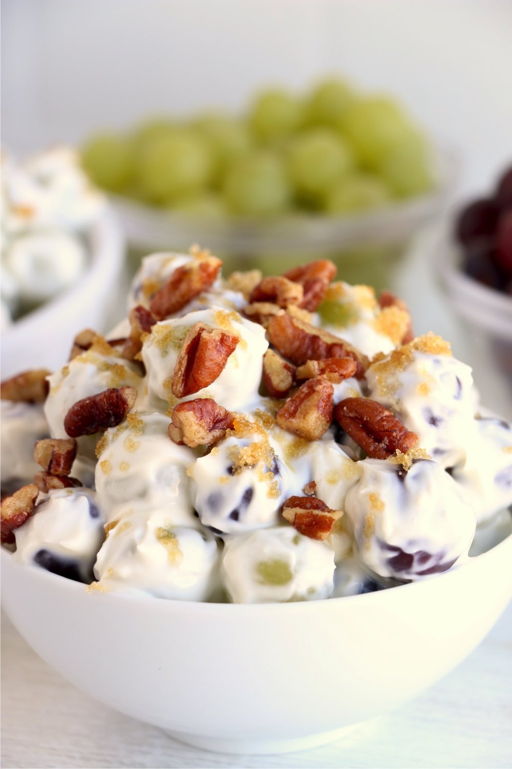 feature of grape salad in white bowl
