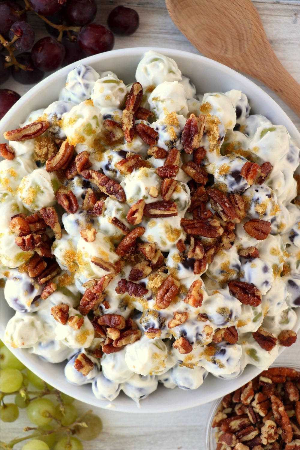 overhead shot of grape salad topped with pecans