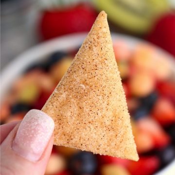 holding up a pie crust chip