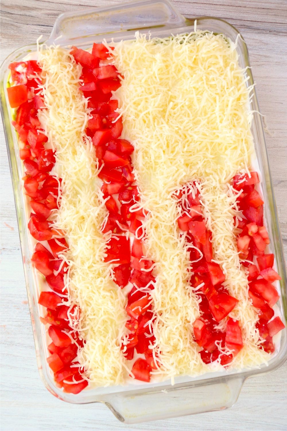 tomatoes and cheese in the design of an American flag