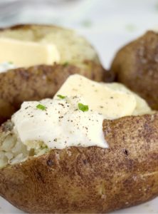 Baked potatoes with butter and sour cream