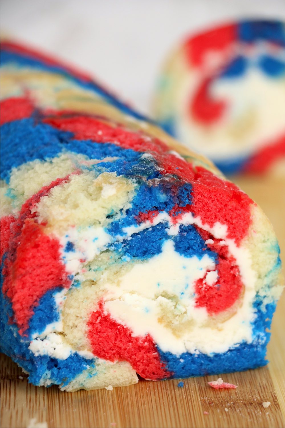 patriotic cake roll on a cutting board