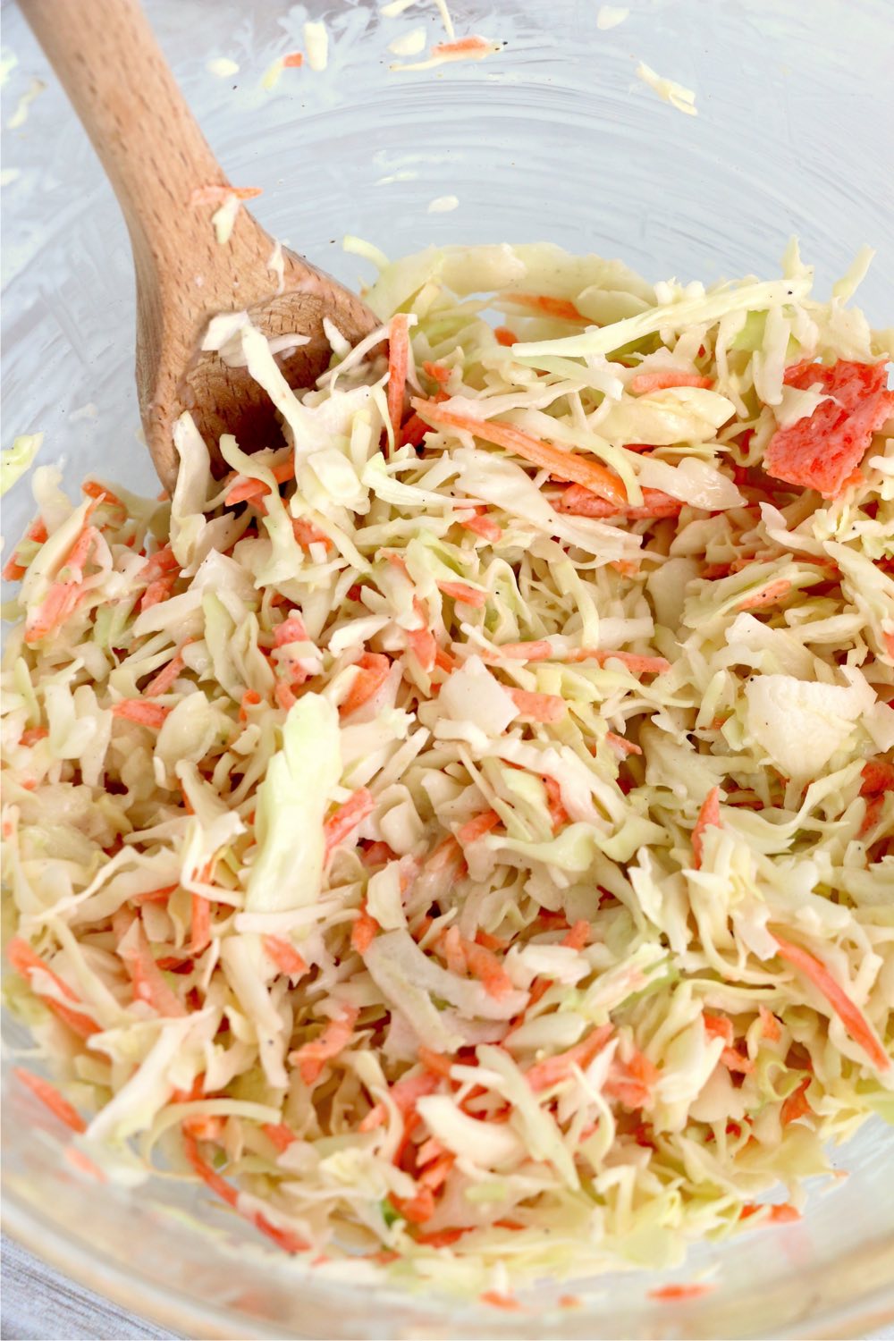 Mixing dressing with bag of coleslaw mix