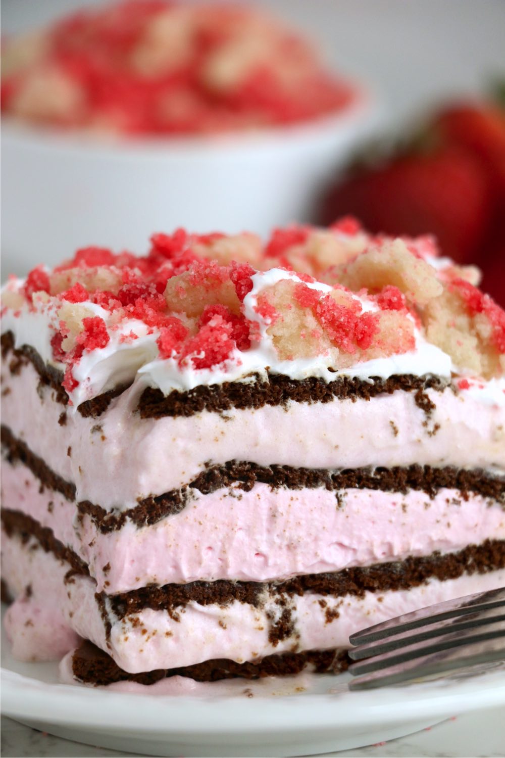 layers of strawberry ice cream in cake