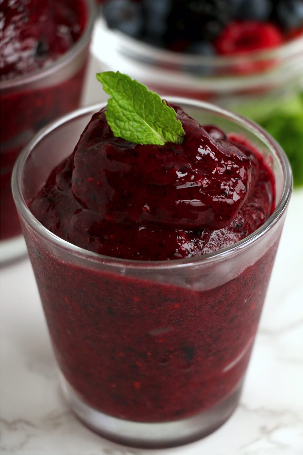 berry sorbet with mint leaf for garnish