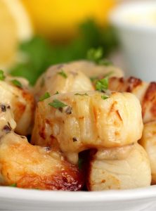scallops topped with parsley