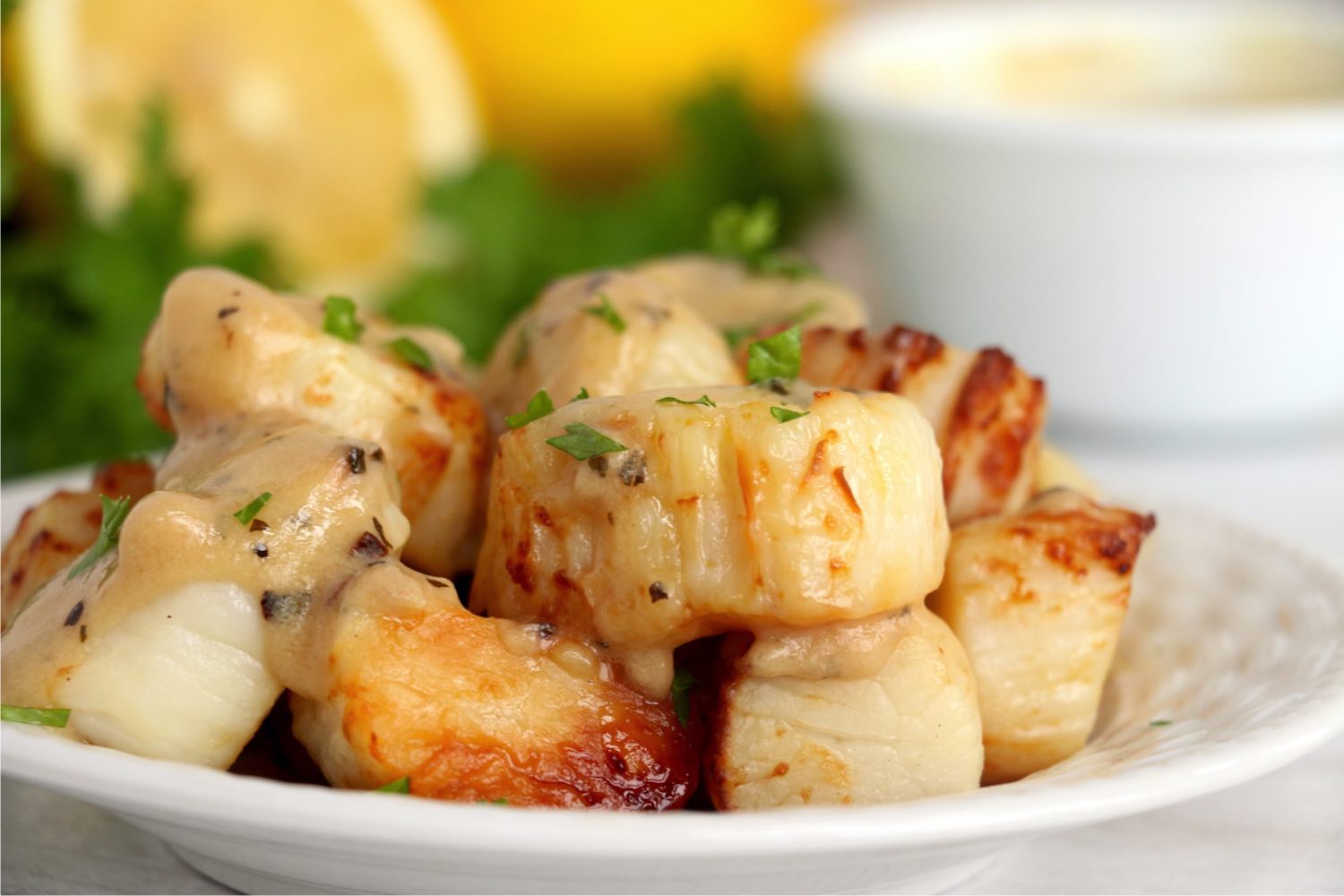 scallops topped with parsley