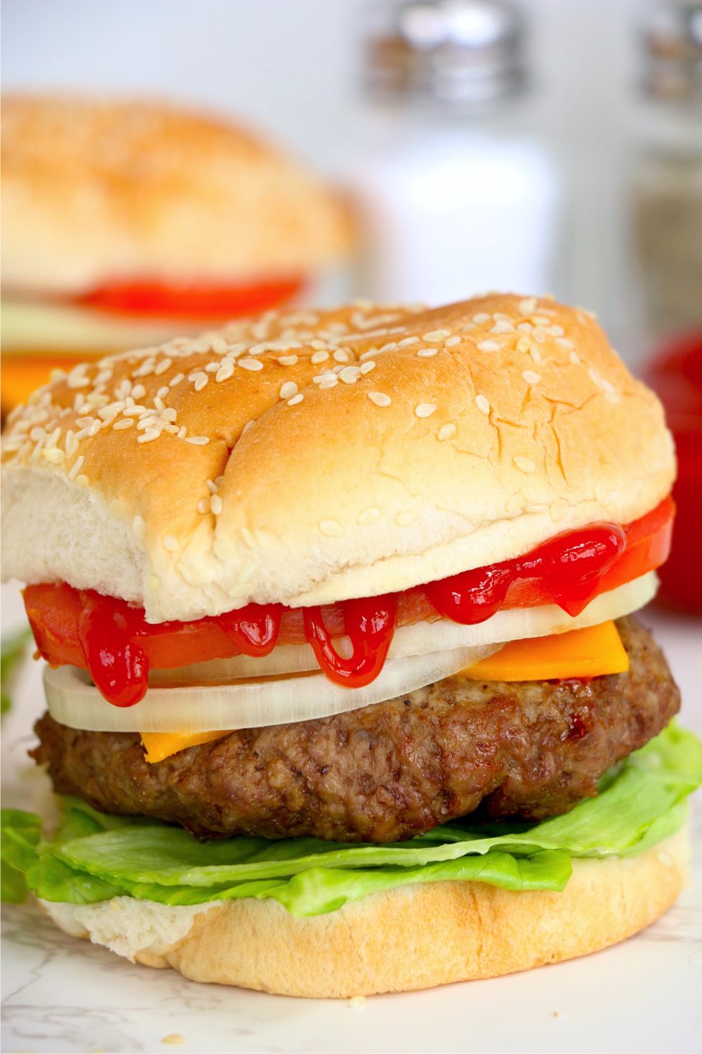 burger with toppings and ketchup