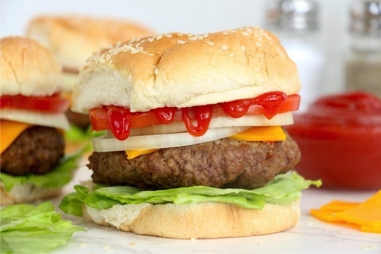 Burgers topped with ketchup
