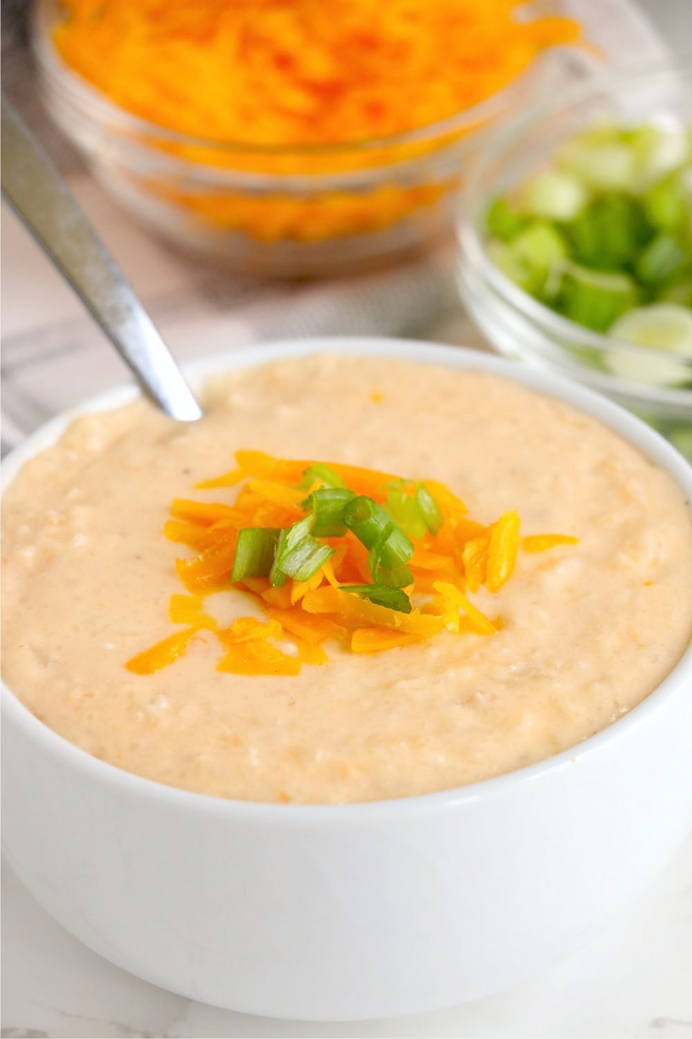 bowl of cauliflower soup with spoon