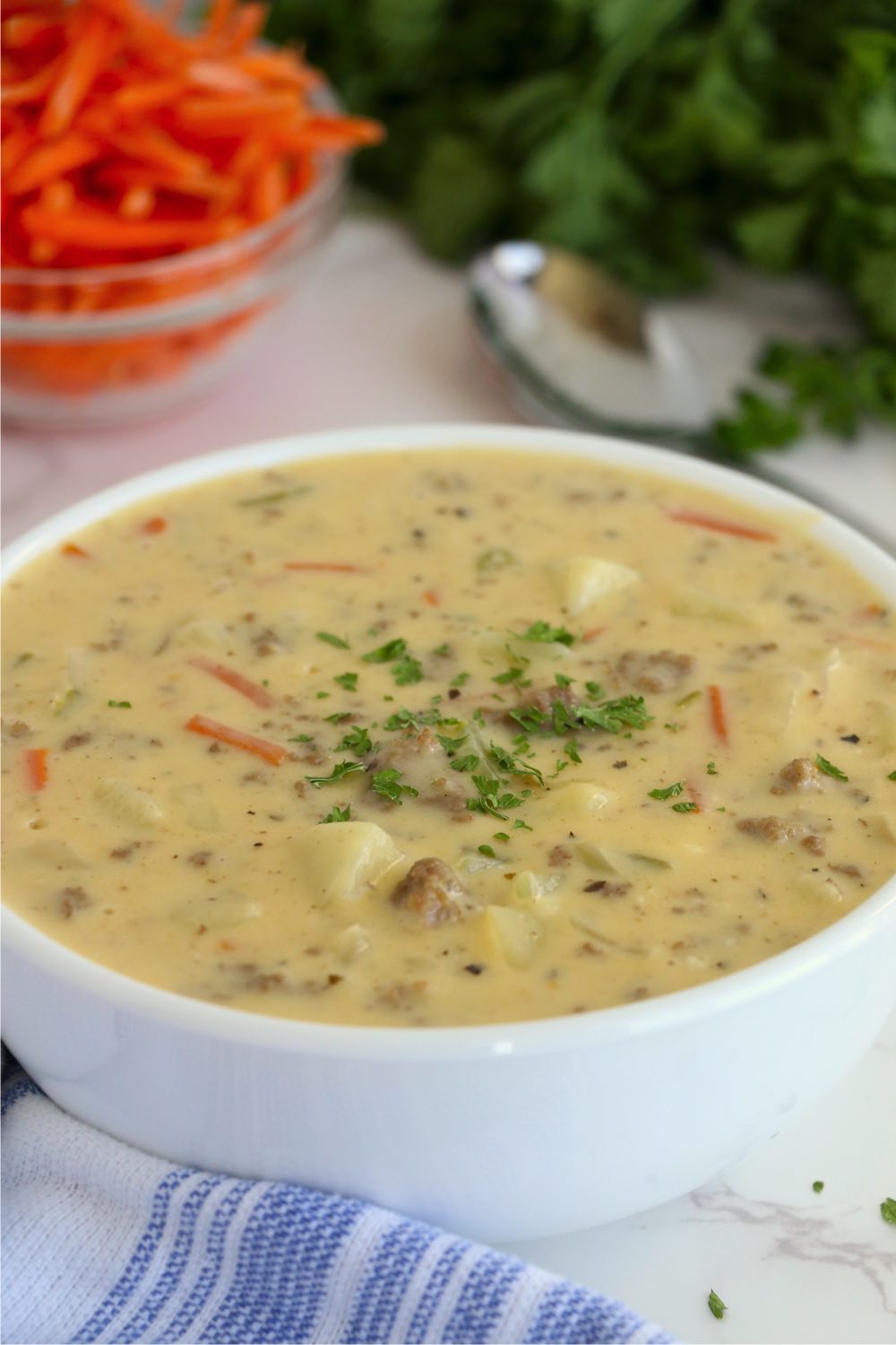 white bowl filled with cheeseburger soup