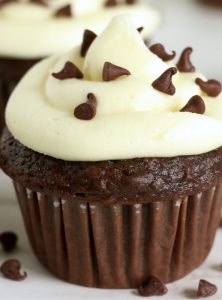 close up of chocolate frosted cupcakes