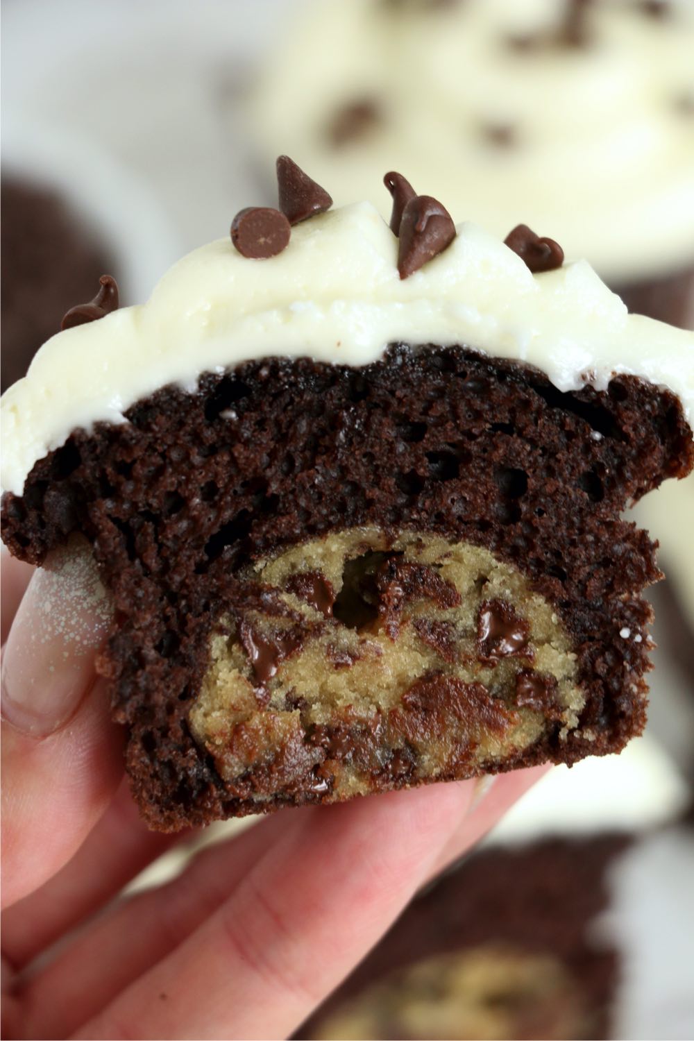 center of a cookie dough filled chocolate cupcake