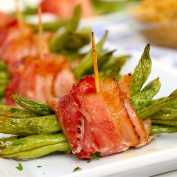 close up of bacon wrapped green bean bundles