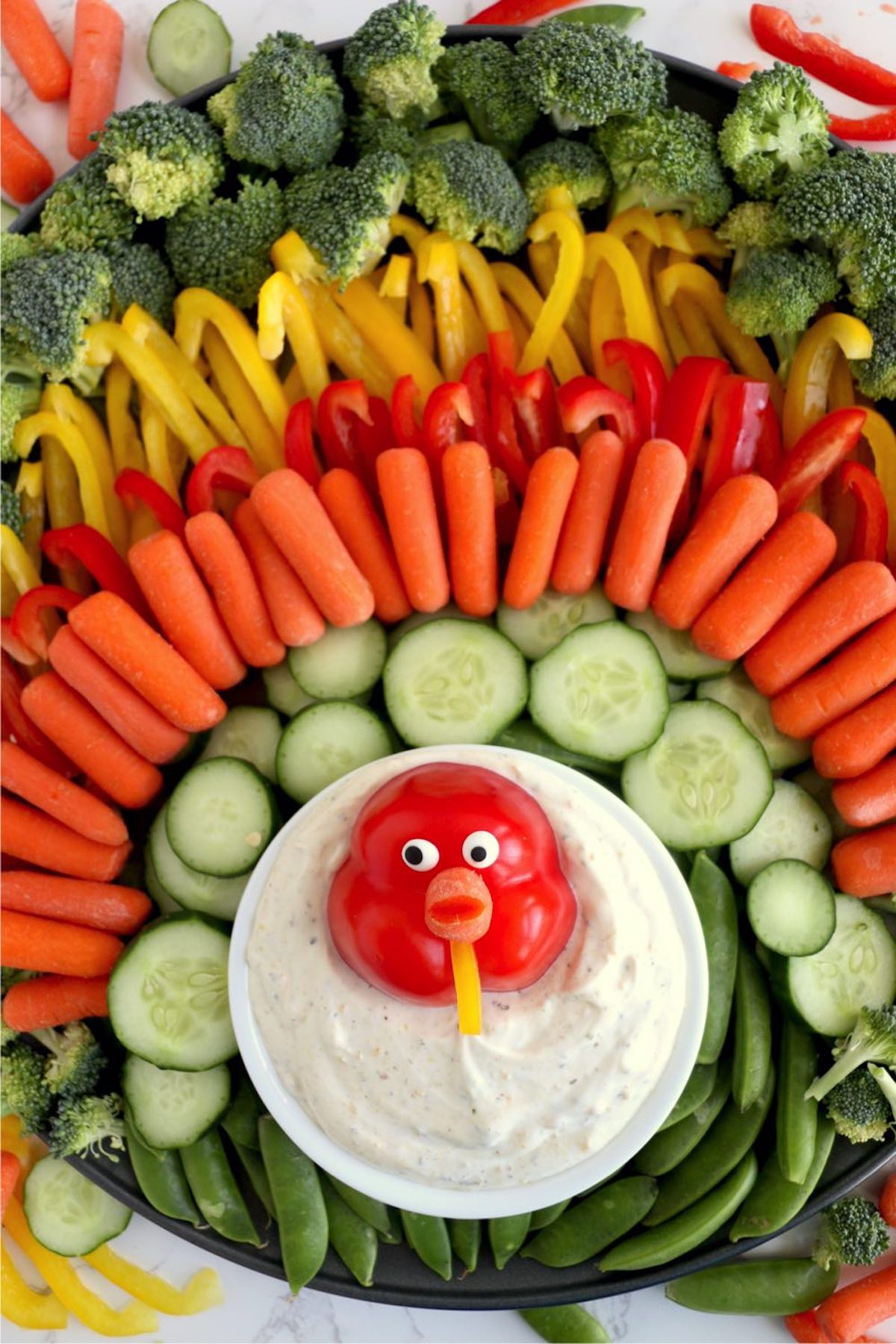 A Thanksgiving-themed veggie tray dressed up like a turkey.