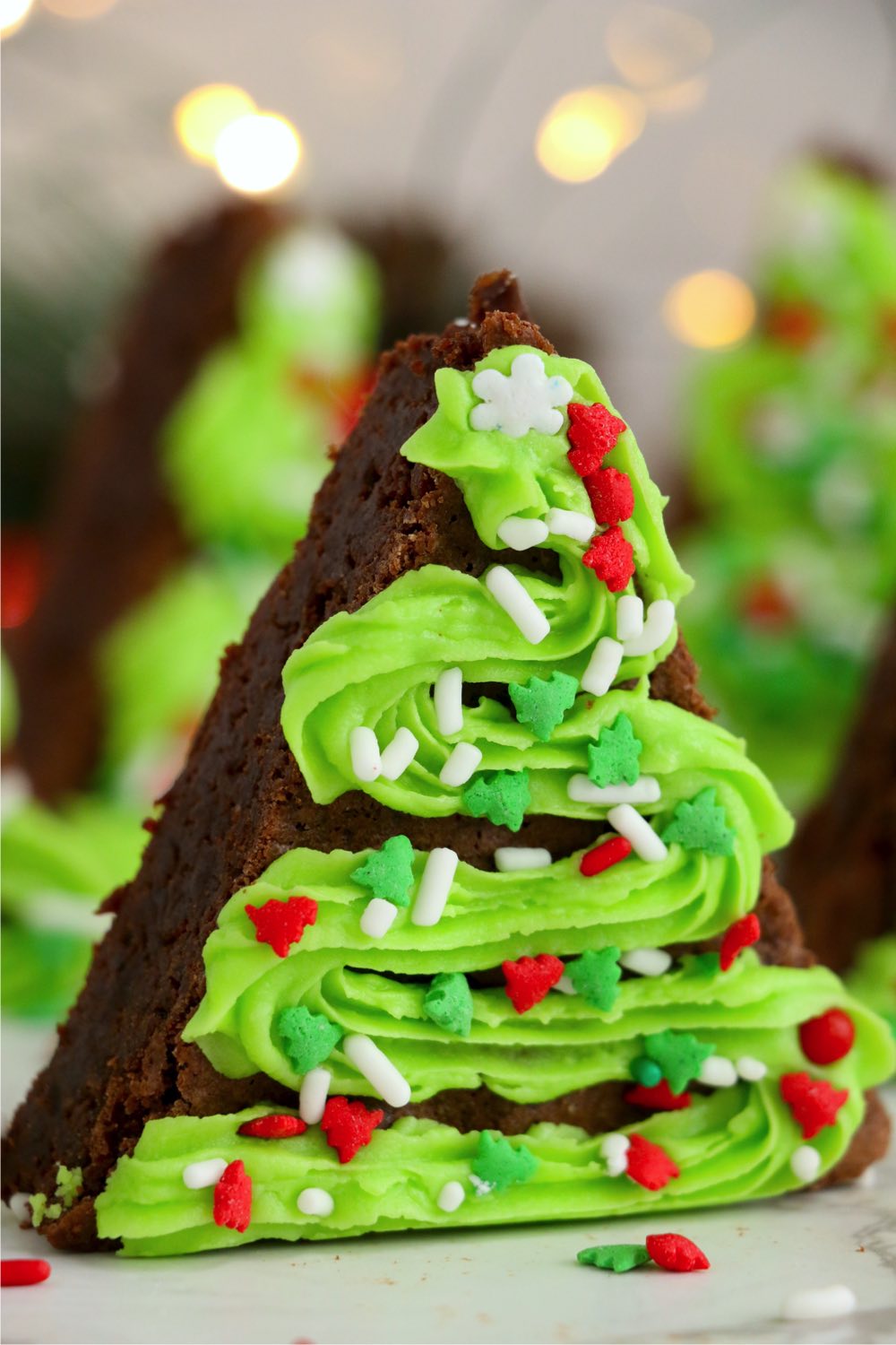triangle brownies decorated like Christmas trees