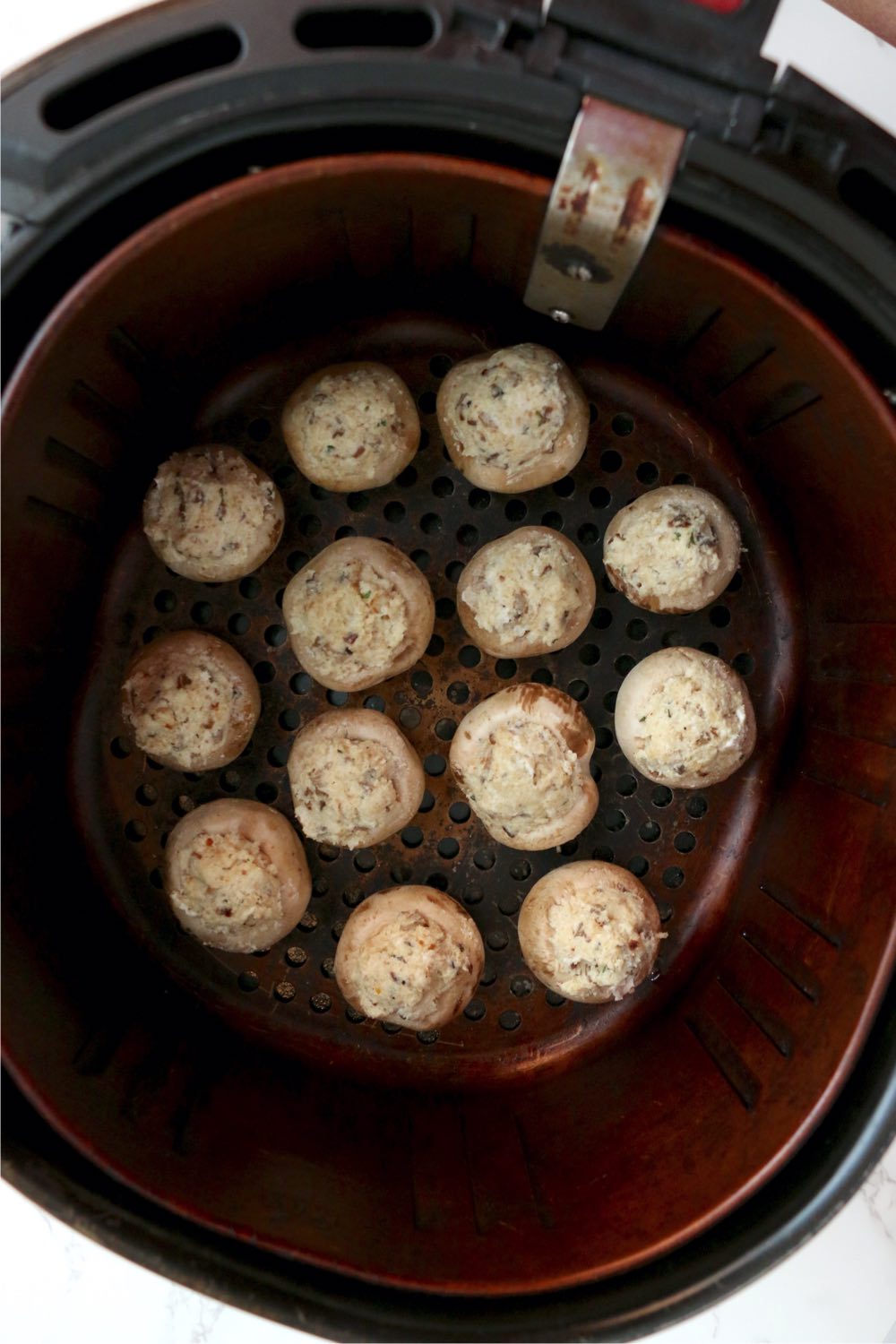 stuffed mushroom caps in air fryer basket