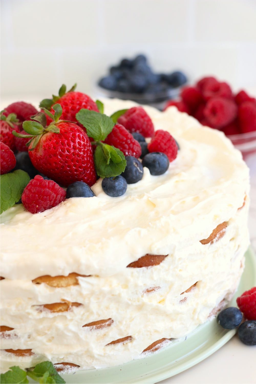 cake with fresh berries on top