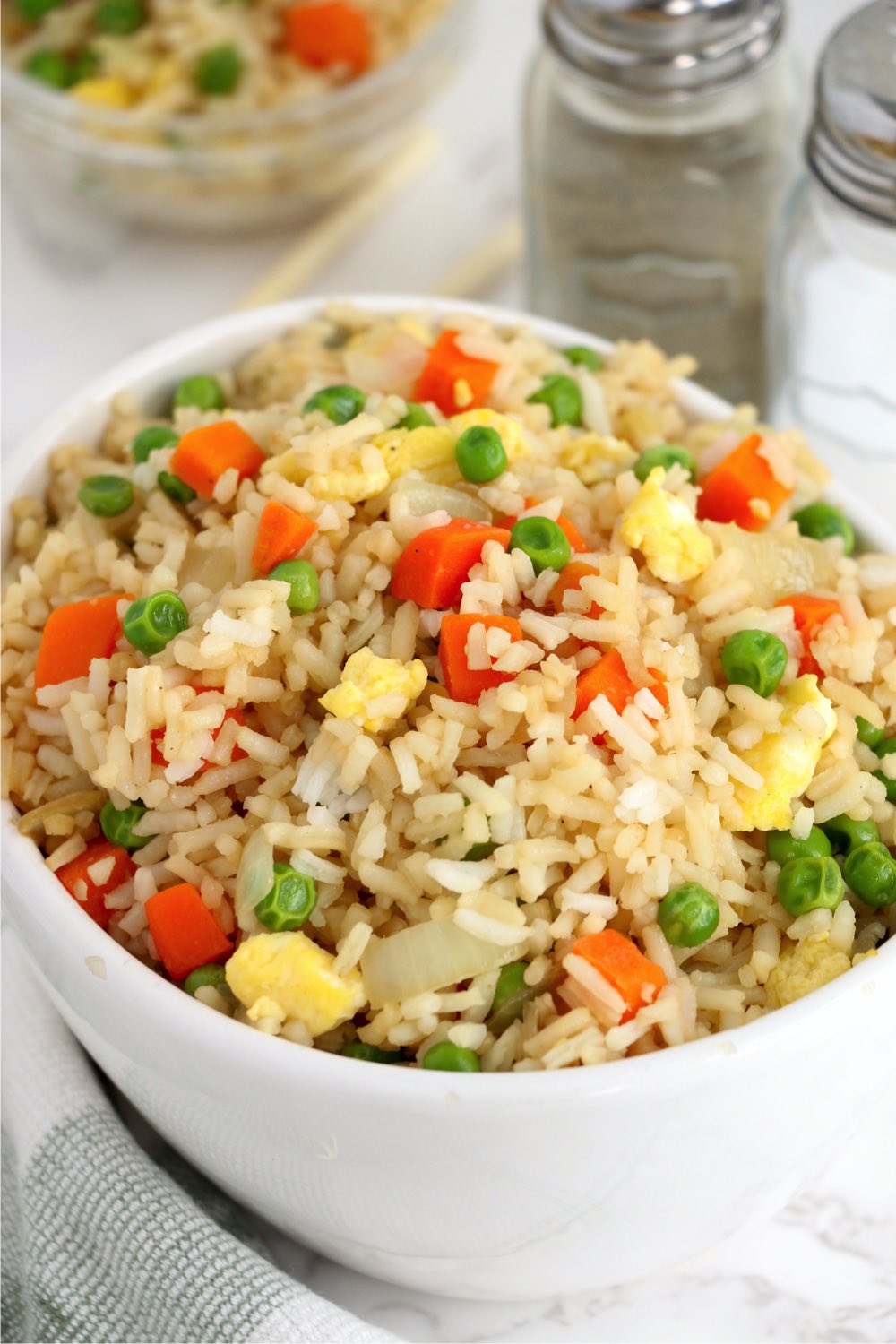up close shot of fried rice in white bowl