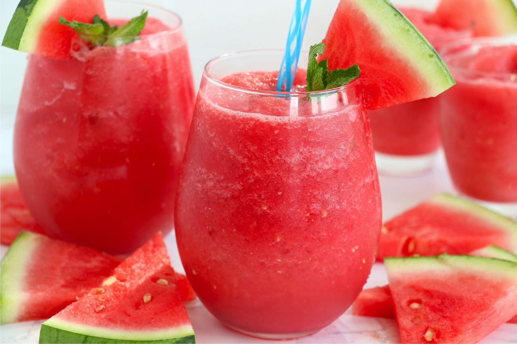 frozen watermelon drink with blue straw