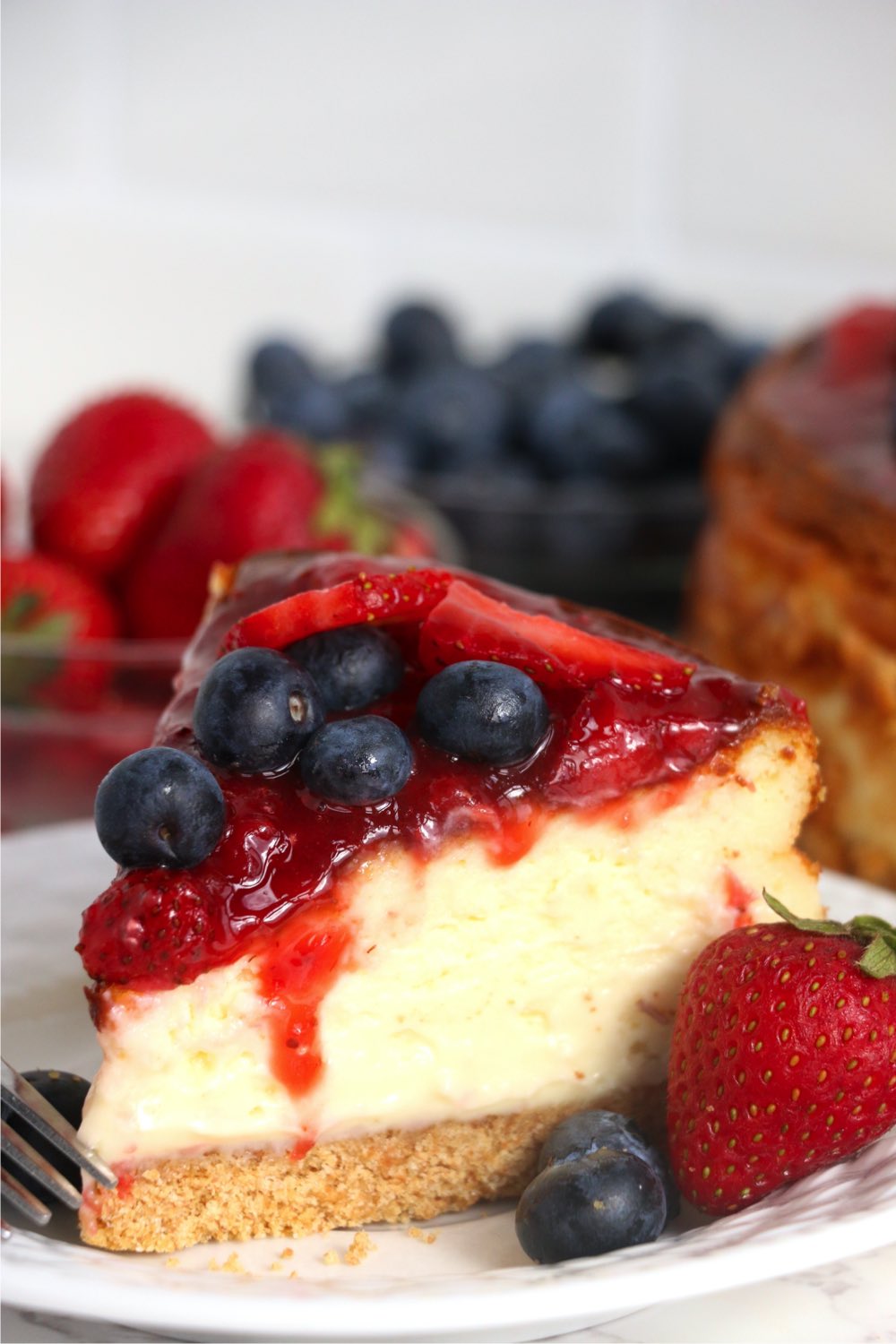 slice of berry cheesecake made in the air fryer