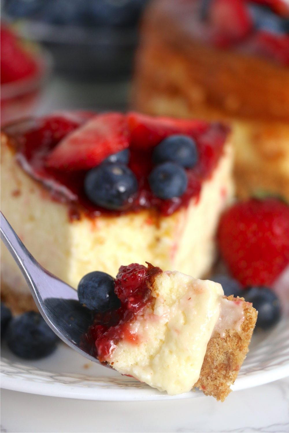 forkful of berry cheesecake