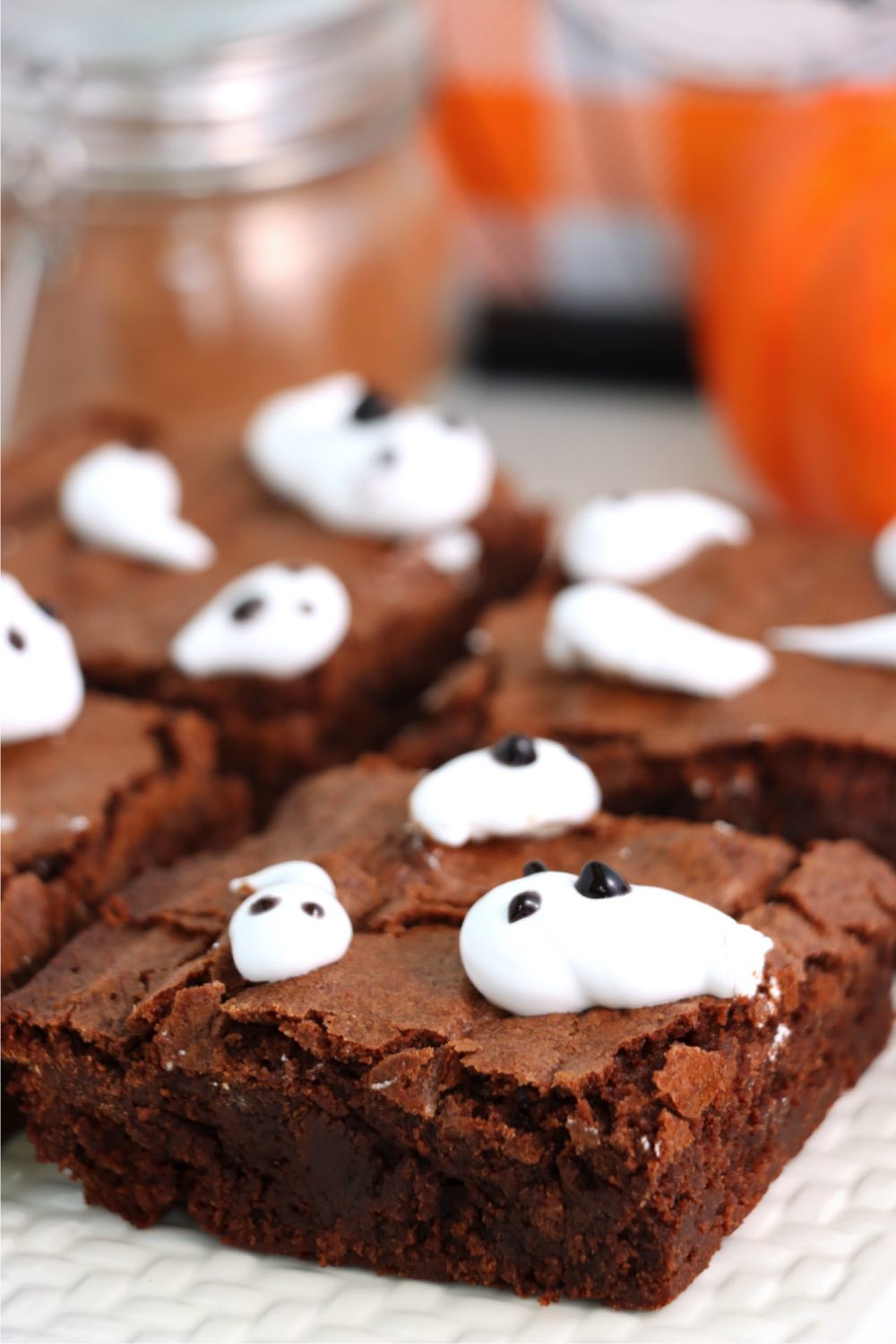 pieces of brownies with homemade marshmallow shaped like ghosts