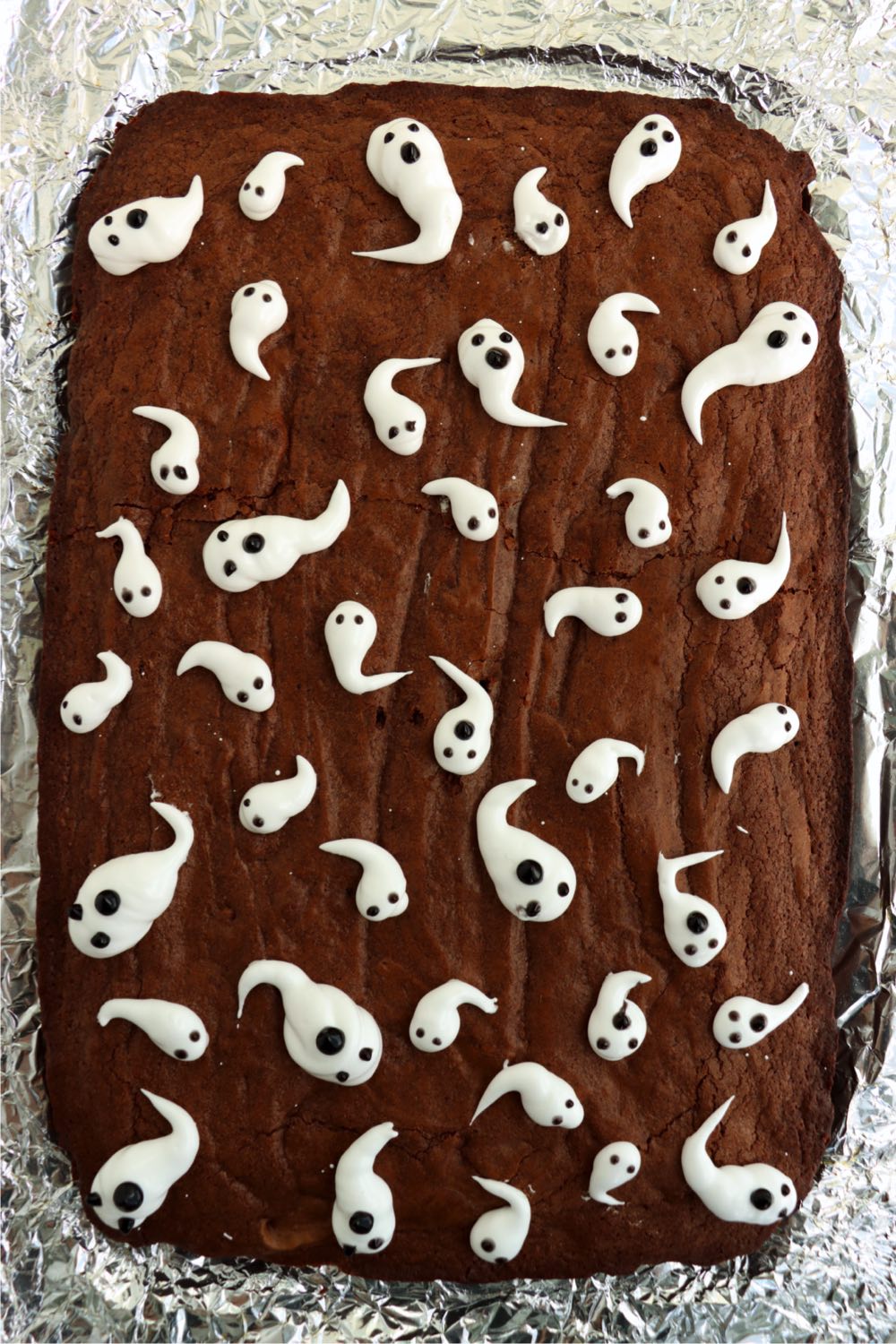 pan of brownies topped with marshmallow ghosts