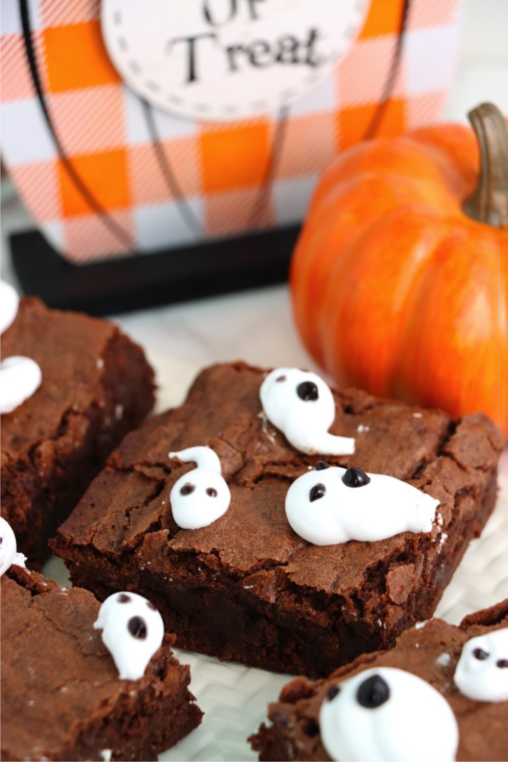 cut brownies with marshmallow ghosts on top