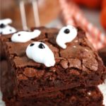 up close shot of brownies with Halloween ghosts on top