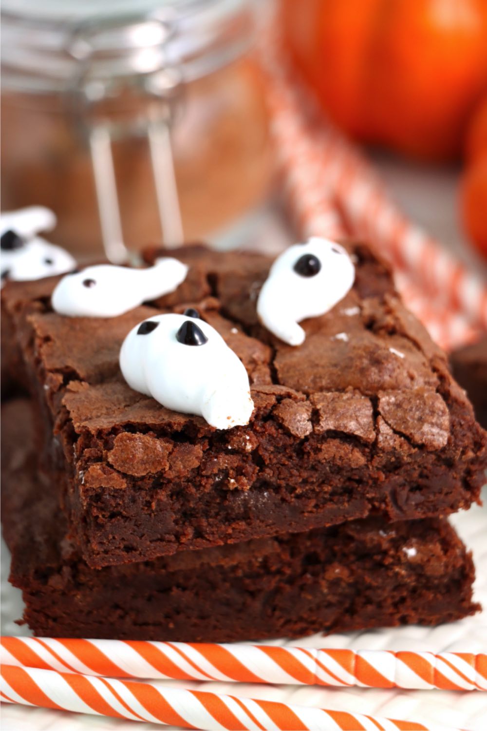 up close shot of brownies with Halloween ghosts on top